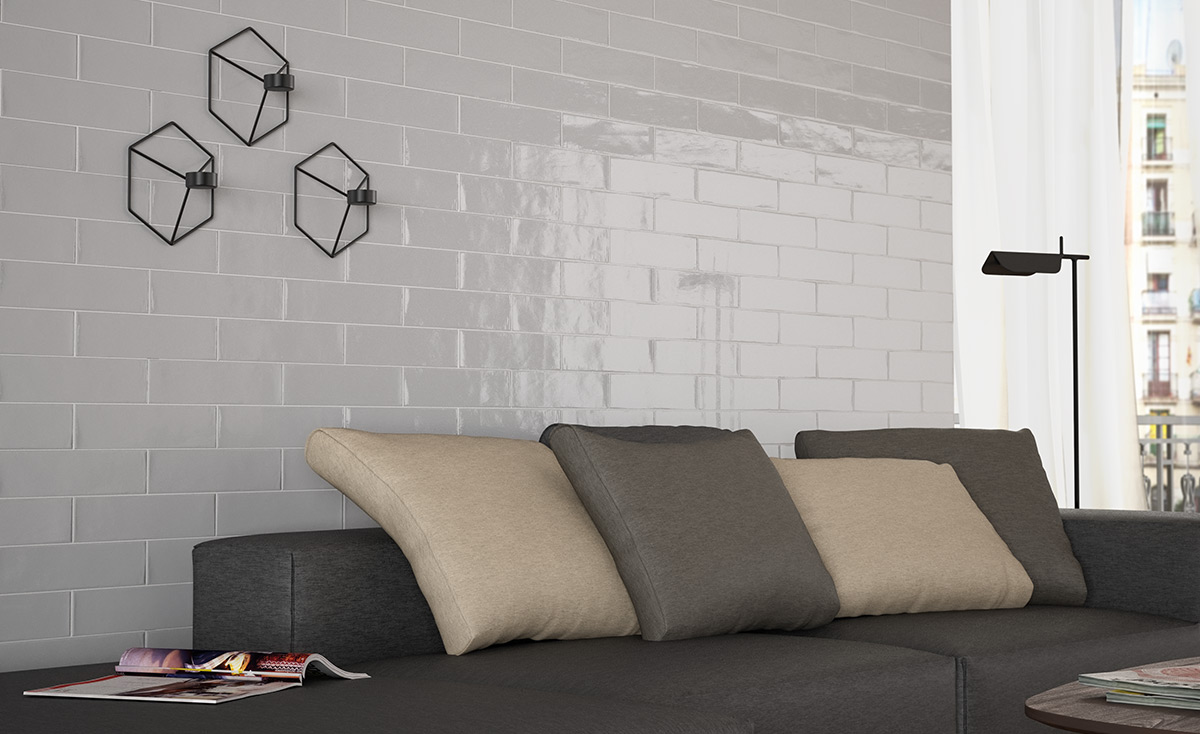 Graue Metrofliesen als Wandverkleidung im Wohnzimmer